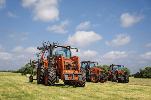 Lineup of Utility Tractors on a field