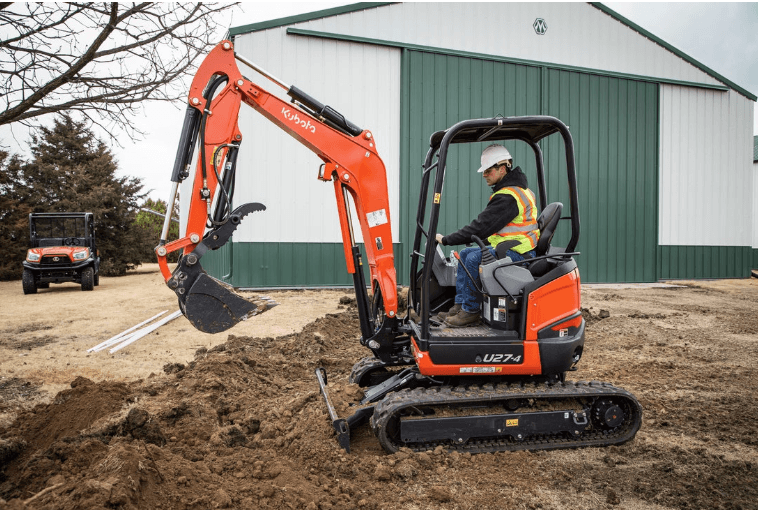 Man using excavator to dig 